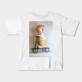 Gnome riding a scooter Kids T-Shirt
